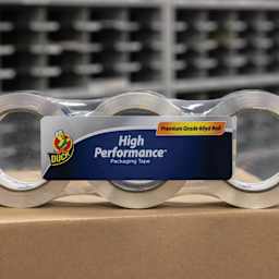Duck HP260 High Performance Premium Packing Tape - 1.88" x 60 yds, Pkg of 3 - sitting on cardboard box