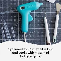 Cricut All-Temp Mini Hot Glue Sticks (Glue sticks on table with glue gun and other tools)