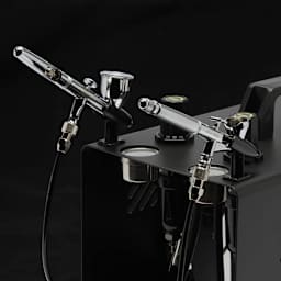 Iwata Power Jet Pro Studio Compressor- Shown with airbrushes in holders (not included)