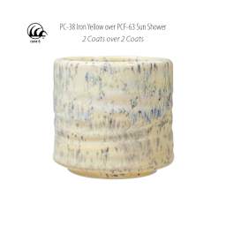 Cone 6. PC-38 Iron Yellow over PCF-63 Sun Shower. 2 Coats over 2 Coats.