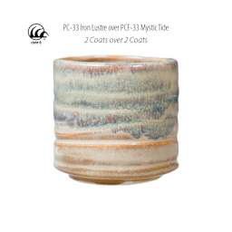 Cone 6. PC-33 Iron Lustre over PCF-33 Mystic Tide. 2 Coats over 2 Coats.