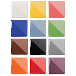 Speedball Ceramic Underglaze - Classic Color Sampler, Set of 12, 2 oz, fired on white clay bisque tiles, half covered in Speedball Clear Glaze, fired to cone 05