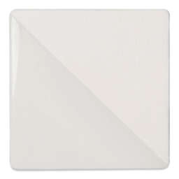 Speedball Ceramic Underglaze - White, Opaque, fired on white clay bisque tiles, half covered in Speedball Clear Glaze, fired to cone 05