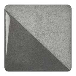 Speedball Ceramic Underglaze - Charcoal, fired on white clay bisque tiles, half covered in Speedball Clear Glaze, fired to cone 05