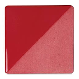 Speedball Ceramic Underglaze - Carmine, Opaque, fired on white clay bisque tiles, half covered in Speedball Clear Glaze, fired to cone 05