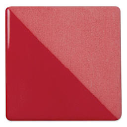 Speedball Ceramic Underglaze - Carmine, Opaque, fired on white clay bisque tiles, half covered in Speedball Clear Glaze, fired to cone 05