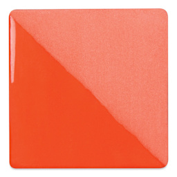 Speedball Ceramic Underglaze - Mandarin Orange, Opaque, fired on white clay bisque tiles, half covered in Speedball Clear Glaze, fired to cone 05