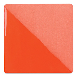 Speedball Ceramic Underglaze - Mandarin Orange, Opaque, fired on white clay bisque tiles, half covered in Speedball Clear Glaze, fired to cone 05