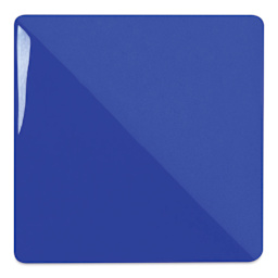 Speedball Ceramic Underglaze - Royal Blue, Opaque, fired on white clay bisque tiles, half covered in Speedball Clear Glaze, fired to cone 05