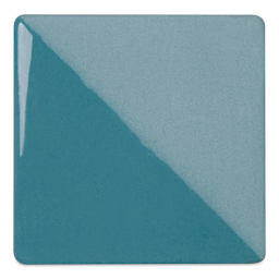 Speedball Ceramic Underglaze - Turquoise, Opaque, fired on white clay bisque tiles, half covered in Speedball Clear Glaze, fired to cone 05