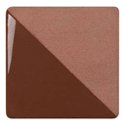 Speedball Ceramic Underglaze - Brown, Opaque, fired on white clay bisque tiles, half covered in Speedball Clear Glaze, fired to cone 05