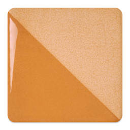 Speedball Ceramic Underglaze - Caramel, fired on white clay bisque tiles, half covered in Speedball Clear Glaze, fired to cone 05