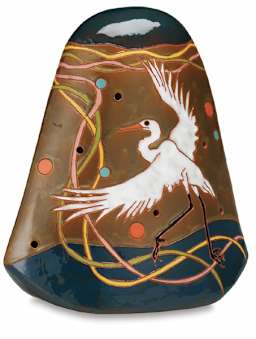 Fired and glazed pottery with a white bird