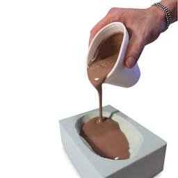 The Monster Makers Monster Clay being poured into a mold