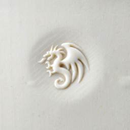 MKM Pottery Tools Curve Top Stamp - Dragon, pressed into clay
