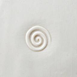 MKM Pottery Tools Curve Top Stamp - Spiral - stamped into clay