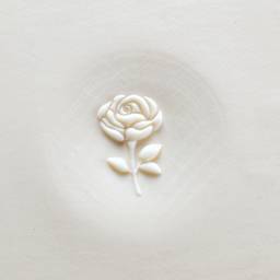 MKM Pottery Tools Curve Top Stamp - Rose with Stem applied to clay