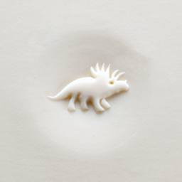 MKM Pottery Tools Curve Top Stamp - Triceratops applied to clay