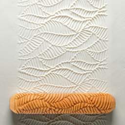 MKM Pottery Tools Big Hand Roller - Layered Leaves applied to clay