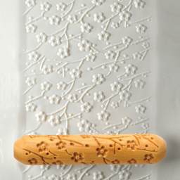 MKM Pottery Tools Big Hand Roller - Plum Blossom applied to clay