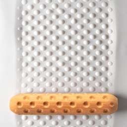 MKM Pottery Tools Big Hand Roller - Dots applied to clay