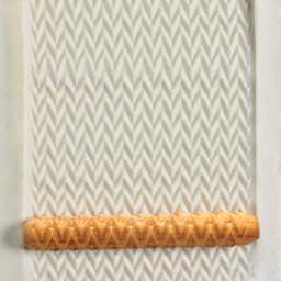 MKM Pottery Tools Hand Roller - Horizontal Zig Zag applied to clay