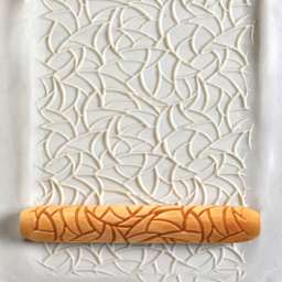 MKM Pottery Tools Hand Roller - Frost applied to clay