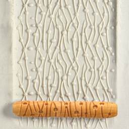 MKM Pottery Tools Hand Roller - Dots and Lines applied to clay