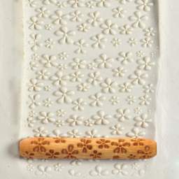 MKM Pottery Tools Hand Roller - Daisy applied to clay