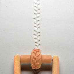 MKM Pottery Tools Small Handle Roller - Leafy Vine applied to clay