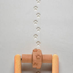 MKM Pottery Tools Small Handle Roller - Dog Prints applied to clay