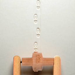 MKM Pottery Tools Small Handle Roller - Boot Tracks applied to clay