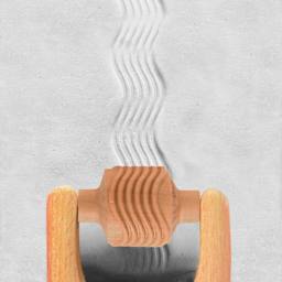 MKM Pottery Tools Medium Handle Roller - Wavy Lines applied to clay