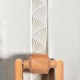 MKM Pottery Tools Medium Handle Roller - Deco Fans applied to clay