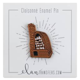Elan Transfers Enamel Pin - Reduction Kiln pinned to front of packaging