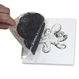 Mayco Designer Silkscreens - Artist's hand applying glaze to Octopus screen