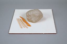 Amaco Canvas-Covered Board - Front view of board with wet clay and tools