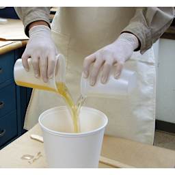 Smooth-Cast 300 being poured and mixed in container