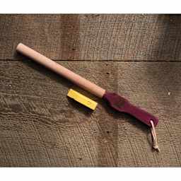 Flexcut Hook Strop, on wood surface