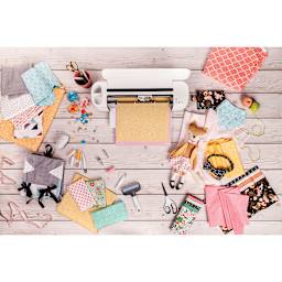 Cricut Maker shown with supplies