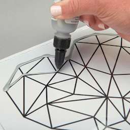 Liquid Sculpey - Metallic Silver, 1 oz (being used to trace an outline of a heart)