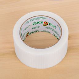 Duck Transparent Tape - Clear, 1.88" x 20 yds laying flat on table