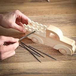 GreatNeck Needle Files - Set of 6 - in use to file toy truck