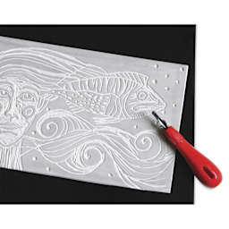 Black Linoleum Grip - Single Grip, 7.5" x 10.25", shown with linoleum block and cutter, not included