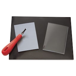 Black Linoleum Grip - shown with printmaking supplies, supplies not included