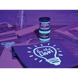 Speedball Night Glo Fabric Screen Printing Inks with painted shirt, glowing in the dark