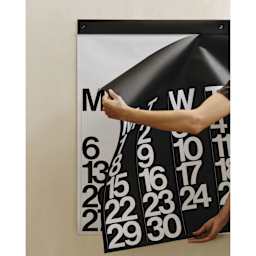 Stendig 2026 Wall Calendar, calendar page being changed