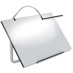 Techne Artist and Drafting Lamp  Lamp lit over drawing board