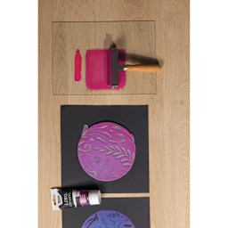 Pebeo Lino Ink - Pink and Blue Duochrome, 80 ml Tube applied to glass plate and carving with brayer