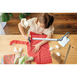 Daylight UnoPro Table Lamp - top view of lamp in use on table